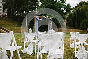 Fragment like view of nice chairs ready for wedding ceremony