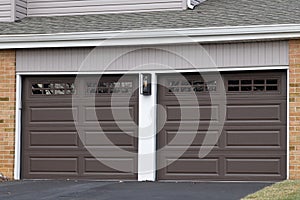 Fragment of a luxury house with a garage door