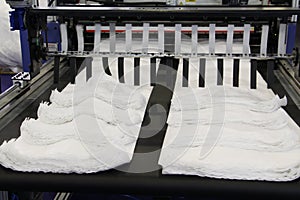 A fragment of a machine for the production of plastic bags