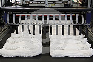 A fragment of a machine for the production of plastic bags