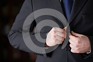 Fragment of a man in a business suit