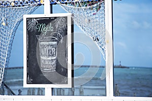 Fragment of the menu on the blackboard with text