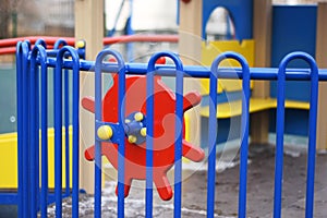 A fragment of modern bright colorful swings on the Playground. An ideal place for children`s outdoor activities photo