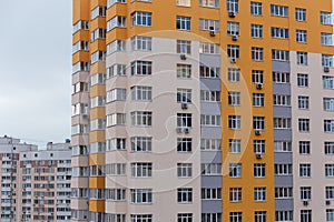 Fragment of the modern multistory residential house in housing estate