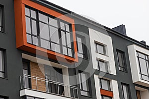 Fragment of Modern residential apartment with flat buildings exterior. Detail of New luxury house and home complex. Part