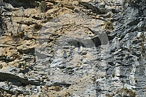 Fragment of a mountain, rocks, stone texture, natural background