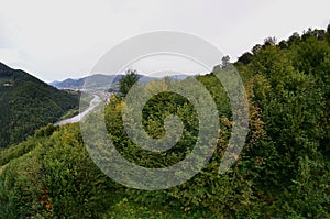 Fragment of the mountainous terrain in the Carpathians, Ukraine. The forest is forgiven by the reliefs of the Carpathian Mountains