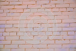 Fragment of an old beige  brick wall close up. Contemporary expressive element for wide range of ideas in interior or graphic desi