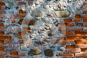 Fragment of an old brick wall