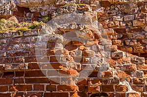 Fragment of old brick wall