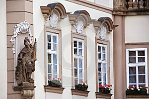 Fragment of an old building with flowers