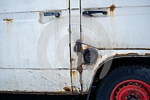 Fragment of an old rusty van car