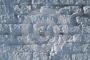 Fragment of an old white brick wall close up. Contemporary expressive element for wide range of ideas in interior or graphic desig