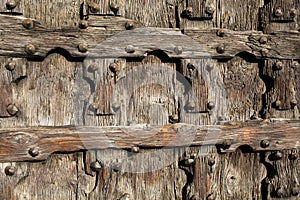 Fragment of old wooden door. Fragment of the old door with hats nails