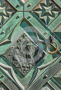 Fragment old wrought iron door, knocker - Cracow, Poland- Saint Mary Basilica-Mariacki Church photo