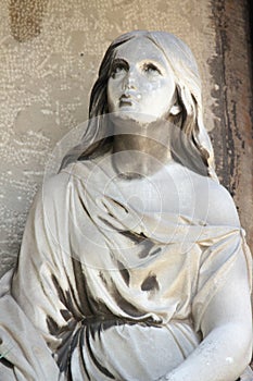 Fragment os statue of Mary Magdalene photo