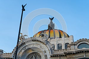 Fragment of Palacio de Bella Artes in Mexico city. View of dome with blue sky. Travel, architecture photo. Background