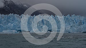 Fragment of the Perito Moreno glacier. A wall of cracked blue ice