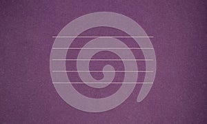 A fragment of the purple cover of a notebook, a school notebook, with lines for your text