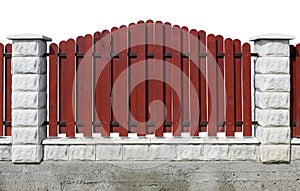 Fragment of a red rural fence isolated