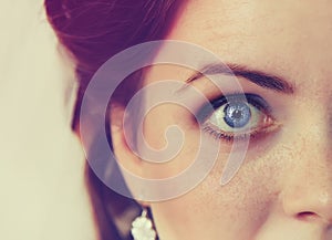 Fragment of red woman face with stylish makeup