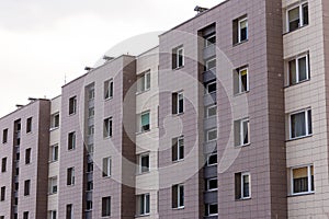 Fragment residential apartment with flat building exterior. Detail of New luxury house and home complex