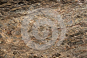 A fragment of a rock that collapses and crumbles photo