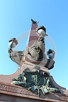 Fragment of the rostral column of the Trinity Bridge. St. Petersburg.