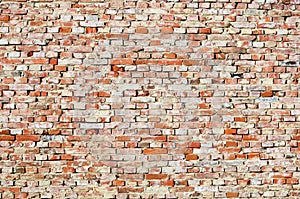 Fragment of rough brick wall