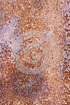 Fragment of a rusty iron sheet