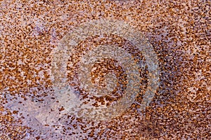 Fragment of a rusty iron sheet