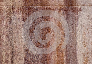 Fragment of a rusty iron sheet