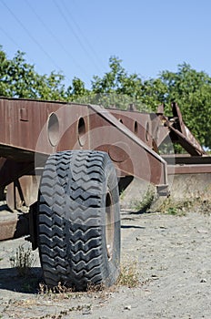 Fragment of a rusty wheeled agricultural plow