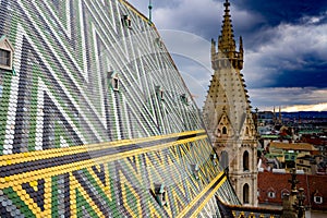 Fragment of Saint Stephen`s Cathedral Stephansdom. Colorful roof and tower. Wien. Vienna. Austria.