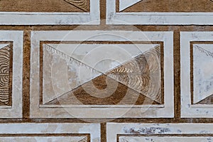 Fragment of sgraffito on the wall of a house