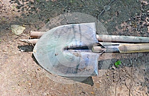 Fragment of shovel lying on ground