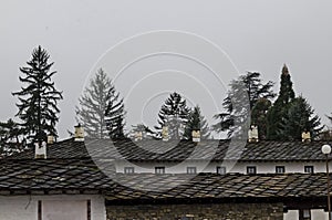 Fragment of the stone roof of the ancient Troyan Monastery founded in 1600 and restored in 1830-1865, Oreshak village