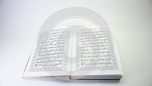 fragment of surah al-quran, al-kahf, selected focus  on white background