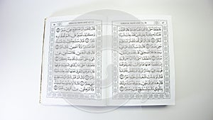 fragment of surah al-quran, al-kahf, selected focus  on white background