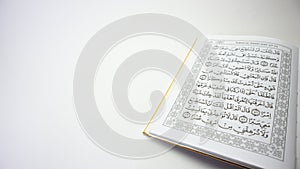 fragment of surah al-quran, al-kahf, selected focus  on white background