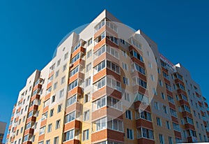 Fragment of the upper part of an apartment building.