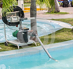 Fragment of view of old technology electrical pump for cleaning swimming pool