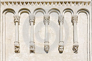 Fragment of wall of church with stone carvings