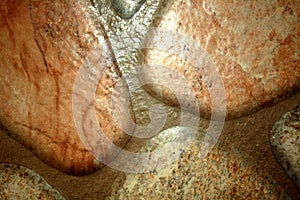 Fragment of a wall with round decorative stones