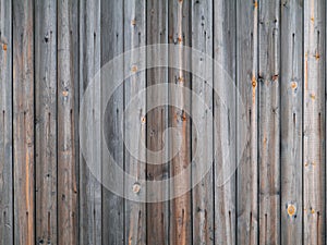 Fragment of weathered wall made of wooden planks