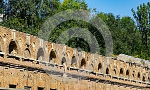 Fragments of ancient brick walls of abandoned Paramonovsky warehouses on embankment of Rostov-on-Don.