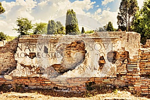Fragments of marble inscriptions placed on the attic of Porta Romana