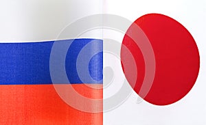 Fragments of the national flags of Russia and Japan