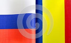 Fragments of the national flags of Russia and Romania