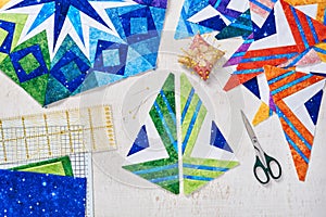 Fragments of quilt, accessories for patchwork, top view